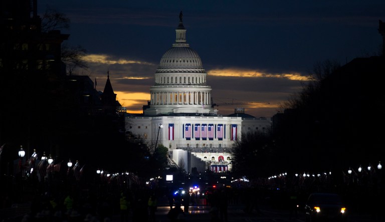 The sun rises behind the Capitol in Washington, Friday, Jan. 20, 2017, where Donald Trump will be sworn-in as the 45th President of the United States.