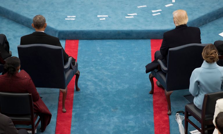 President Trump and former President Barack Obama sit across the aisle from each other during Trump's inauguration at the U.S. Capitol in Washington, Friday, Jan. 20, 2017.