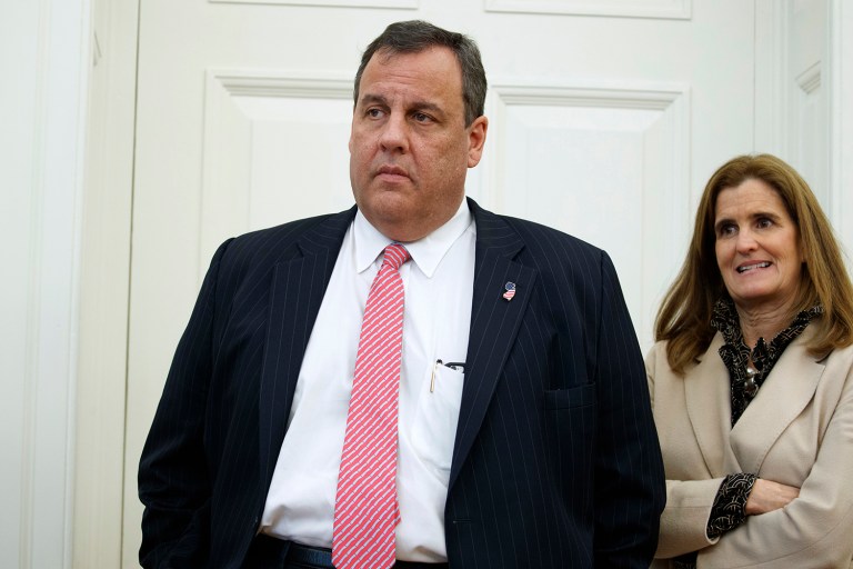 New Jersey Gov. Chris Christie and his wife Mary Pat Christie visit the Oval Office of the White House in Washington.