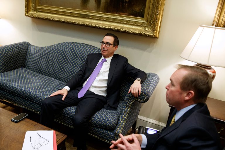 Treasury Secretary Steven Mnuchin, left, sits with Budget Director Mick Mulvaney in the Roosevelt Room of the White House in Washington, Wednesday, Feb. 22, 2017, before a meeting with President Donald Trump on the Federal budget.
