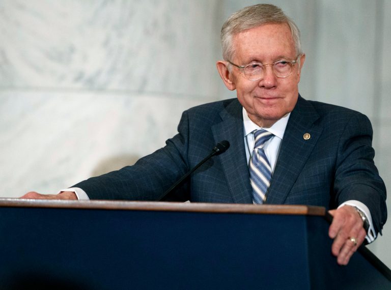 In this Dec. 8, 2016, file photo, Sen. Harry Reid, D-Nev., speaks during a ceremony on Capitol Hill in Washington.
