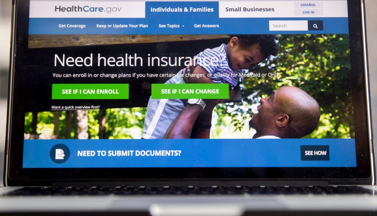 The HealthCare.gov website, where people can buy health insurance, is displayed on a laptop screen in Washington.