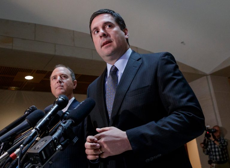 In this photo taken Wednesday, March, 15, 2017, House Intelligence Committee Chairman Devin Nunes, Republican of California, and Rep. Adam Schiff, D-Calif., left, the ranking member, answer questions from reporters about the panel's investigation of Russian influence on the American presidential election and President Donald Trump's charges that he was wiretapped by former President Barack Obama, on Capitol Hill in Washington. President Donald Trump is facing new questions about political interference in the investigations into Russian election meddling following reports that White House officials secretly funneled material to the chairman of the House intelligence committee.