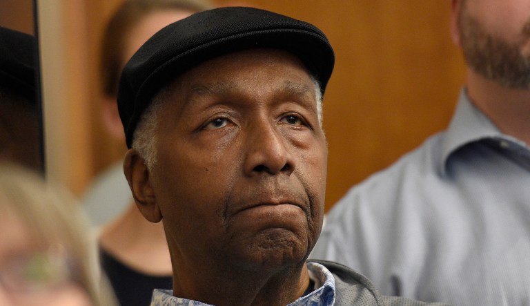 Former Georgetown coach John Thompson, Jr., listens during a press conference.