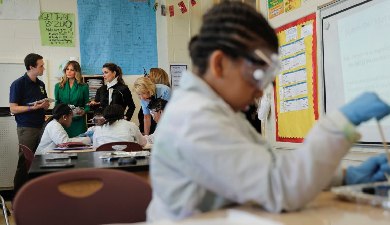 First lady Melania Trump and Queen Rania of Jordan, center, talk with Gregory Dwyre, right, Science teacher at the Excel Academy Public Charter school in Washington, D.C., Wednesday, April 5, 2017. 