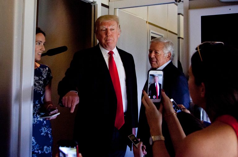 In this March 19, 2017, file photo, President Donald Trump talks to press corps inside Air Force One at the Palm Beach International Airport in West Palm Beach, Fla. Trump is returning to Washington.