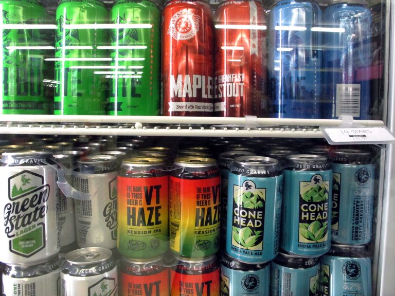 Different varieties of Vermont craft beer sit in a store cooler at Mehuron's Market on Tuesday, May 9, 2017, in Waitsfield, Vt.