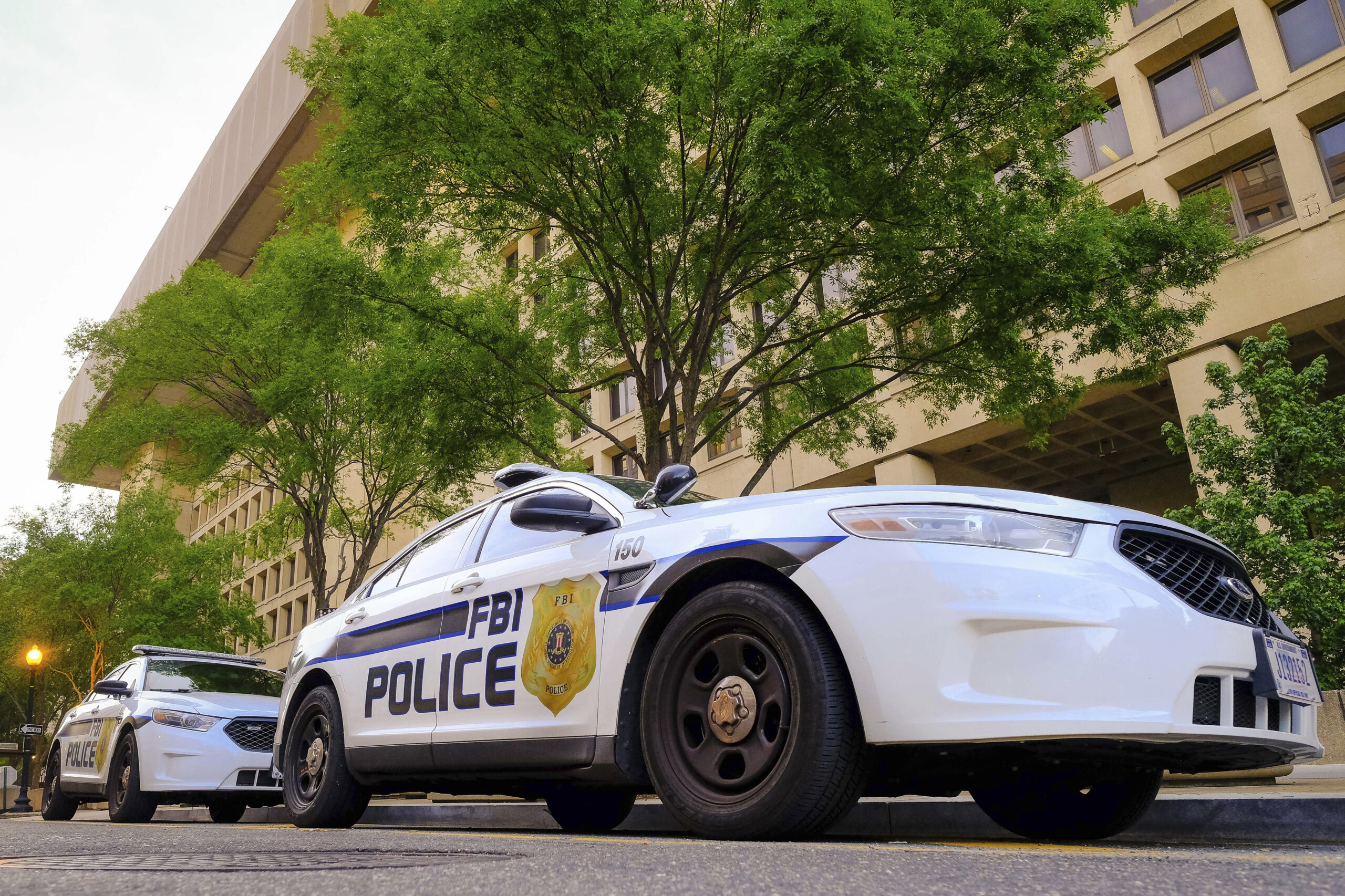 FBI agent who accidentally fired gun after performing backflip in club charged with assault