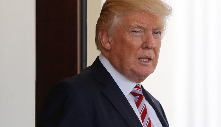President Donald Trump watches Turkish President Recep Tayyip Erdogan depart the White House in Washington, Tuesday, May 16, 2017. The White House defended Trump's disclosure of classified information to senior Russian officials as "wholly appropriate," as Trump tried to beat back criticism from fellow Republicans and calm international allies increasingly wary about sharing their secrets with the new president.