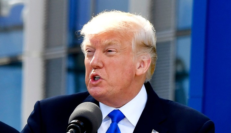 President Trump speaks during a ceremony at NATO headquarters at the NATO summit in Brussels.