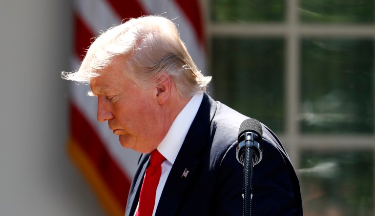 President Trump leaves the podium after speaking in the Rose Garden of the White House in D.C.