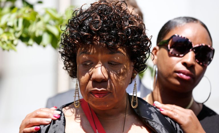 Eric Garner's sister Ellysha Garner, right, consoles Garner's mother Gwen Carr during a press conference, Wednesday, June 21, 2017, in New York. 