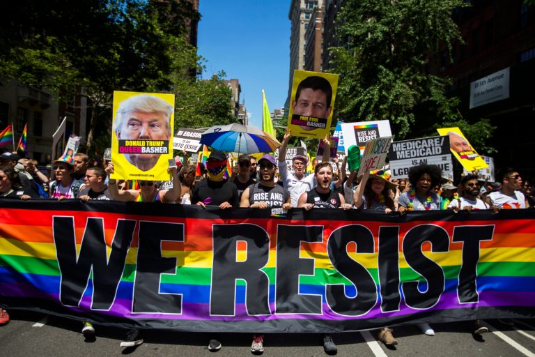 Members of Resist, a foundation that supports people's movements for justice and liberation. protest President Donald Trump and other politicians as they march during the New York City Pride Parade on Sunday, June 25, 2017 in New York.