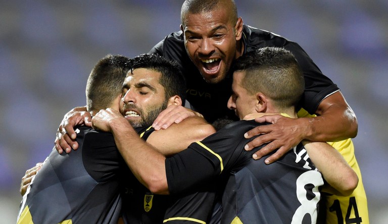Players of Beitar Jerusalem celebrate their 3-0 victory against Vasas after the UEFA Europa League first qualifying round second leg soccer match between Vasas and Beitar Jerusalem at the Szusza Ferenc Stadium in Budapest, Hungary, Thursday, July 6, 2017. 