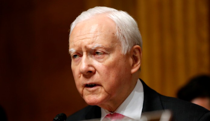 Sen. Orrin Hatch, R-Utah, speaks on Capitol Hill in Washington.