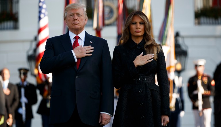 President Trump and first lady Melania Trump stand for a moment of silence to mark the anniversary of the Sept. 11 terrorist attacks. 