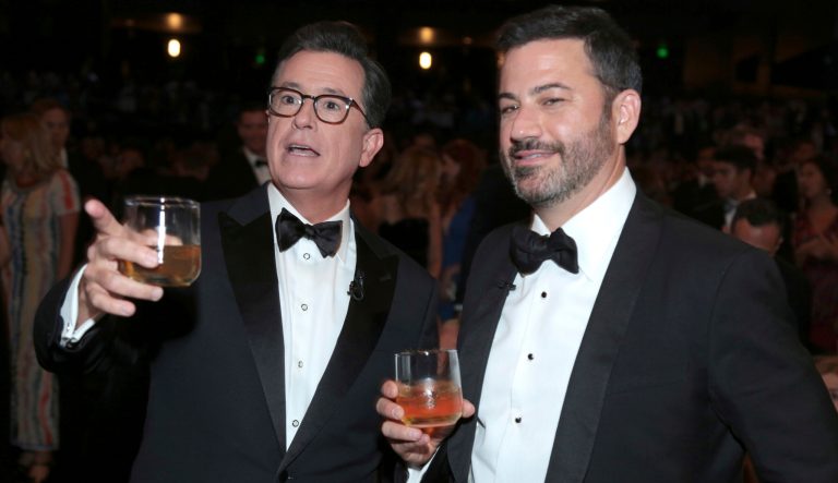 Stephen Colbert, left, and Jimmy Kimmel appear in the audience at the 69th Primetime Emmy Awards on Sunday, Sept. 17, 2017, at the Microsoft Theater in Los Angeles. 