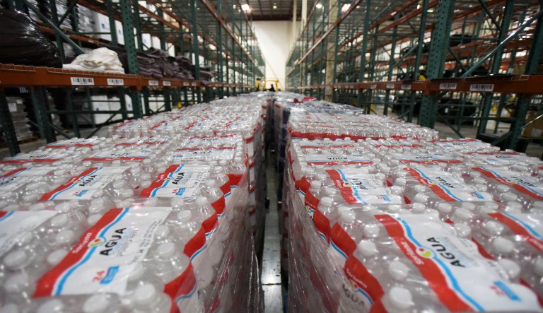 Water bottles sit in a FEMA Central Warehouse as they are organized for delivery to residents after the passage of Hurricane Maria in San Juan, Puerto Rico, in 2017.