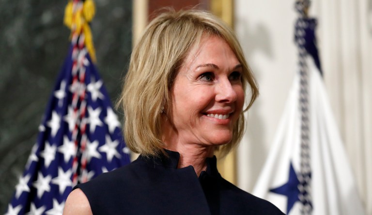 U.S. Ambassador to Canada Kelly Knight Craft stands during her swearing-in ceremony in the Indian Treaty Room in the Eisenhower Executive Office Building on the White House grounds in D.C.