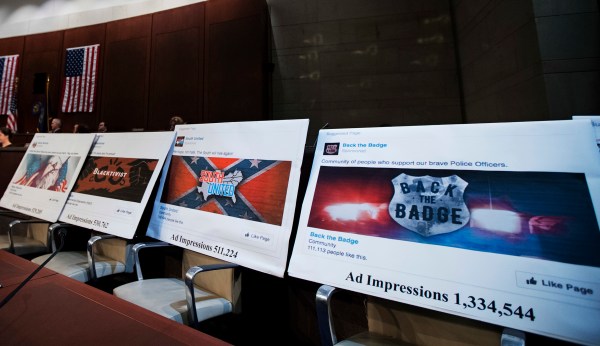 Wisconsin Gov. Scott Walker, former AG Eric Holder call for probe of Russia twitter trolls