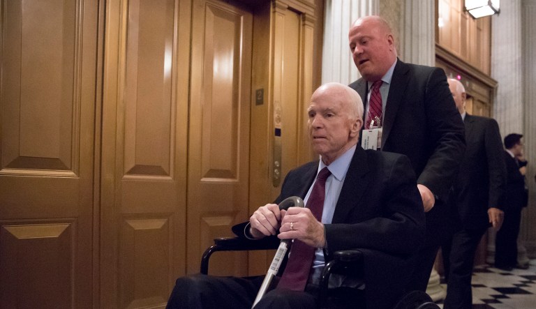 Sen. John McCain, R-Ariz., arrives for votes on Capitol Hill in Washington on Nov. 27, 2017.