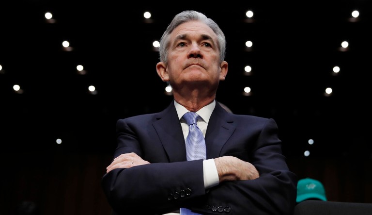 Jerome Powell sits in the audience before being called to testify during a hearing on Capitol Hill in Washington, D.C.