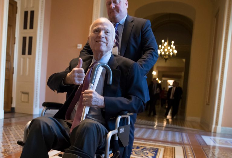 Sen. John McCain, R-Ariz., leaves a closed-door session where Republican senators met on the GOP effort to overhaul the tax code, on Capitol Hill in Washington, Friday, Dec. 1, 2017.