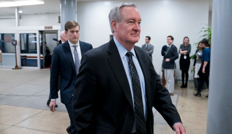 Sen. Mike Crapo, R-Idaho, arrives as Congress prepares to vote on the biggest reshaping of the U.S. tax code in three decades, on Capitol Hill, Tuesday, Dec. 19, 2017, in Washington. 