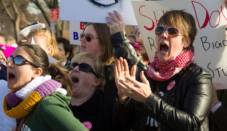 Participants in the Women's March walk to the White House, from the Lincoln Memorial, in Washington, Saturday, Jan. 20, 2018.