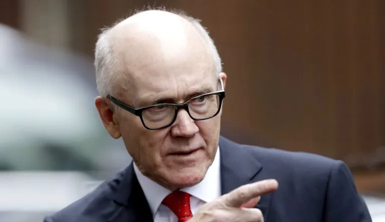 U.S. Ambassador to Britain Woody Johnson leaves from a meeting at 10 Downing Street in London.