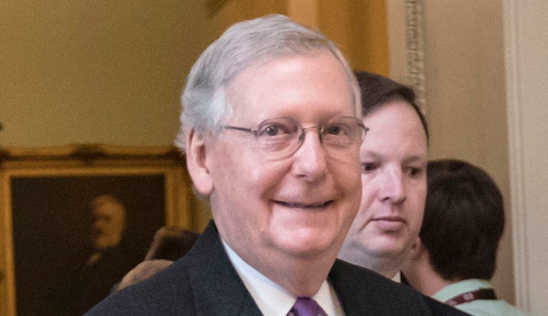 Senate Majority Leader Mitch McConnell, R-Ky., signals a thumbs-up on Capitol Hill in Washington.