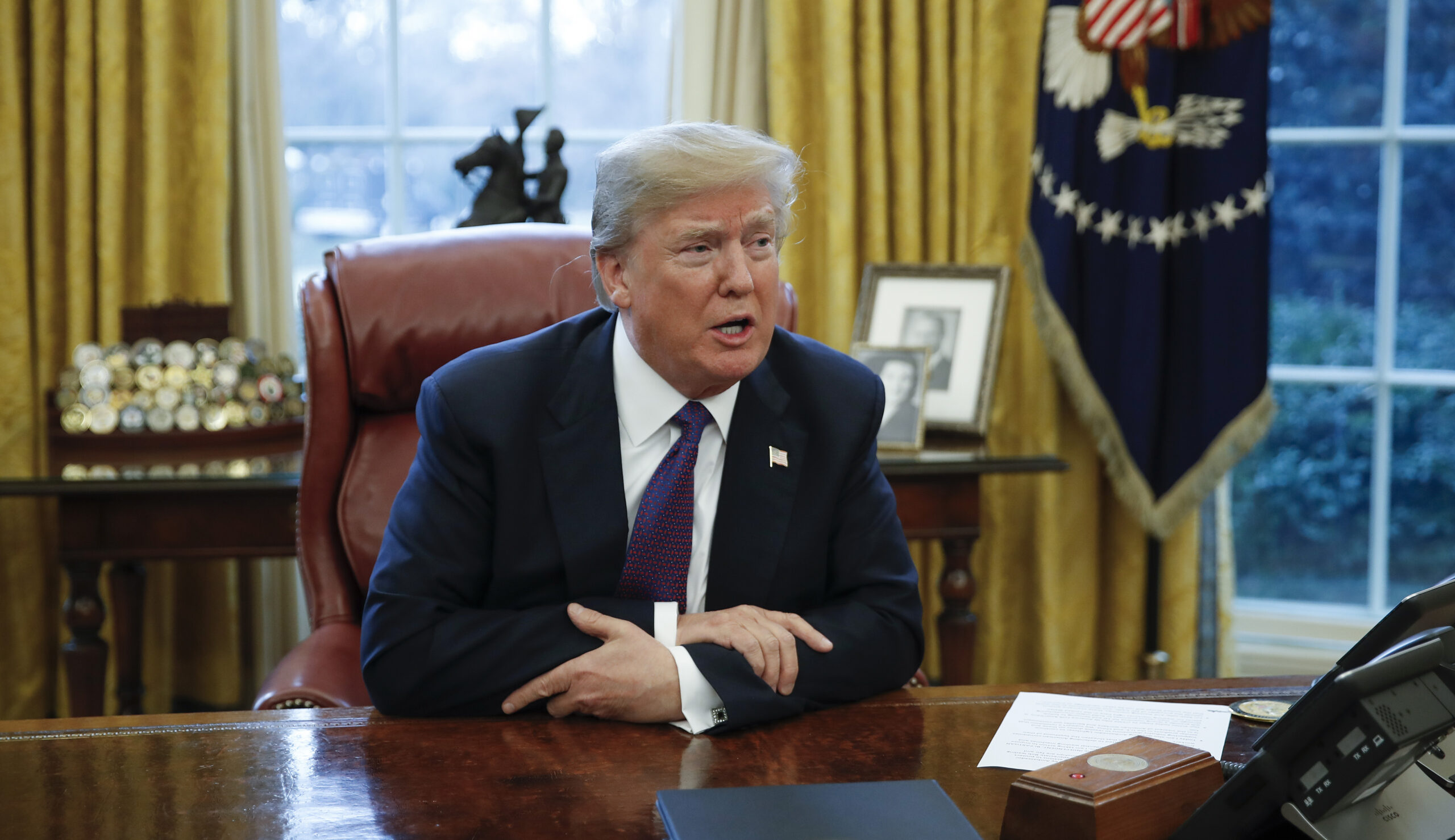 Trump OKs federal worker pay raise of 1.9 percent