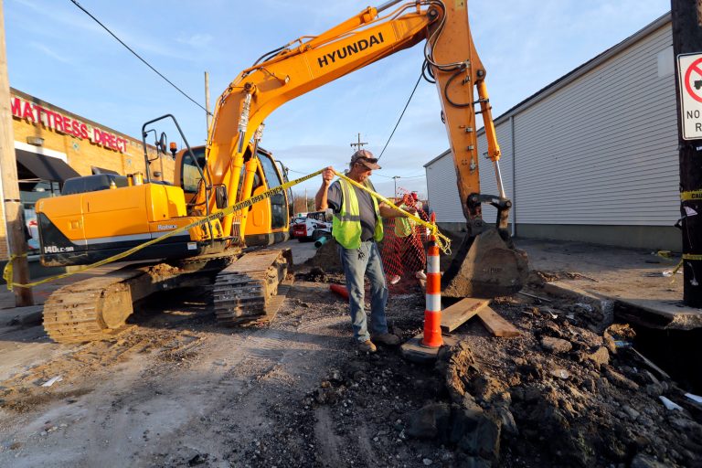 Workers fix a sewer main below the sidewalk in Mid City New Orleans, on Jan. 31, 2018.  The city of New Orleans is perhaps one of the best examples of what President Trump calls the countryâs âcrumbling infrastructure.â City officials say New Orleans needs more than $11 billion to update key parts of its infrastructure. (AP Photo/Gerald Herbert)