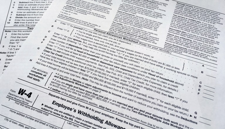 This photo shows an IRS W-4 form on Feb. 1, 2018, in New York.