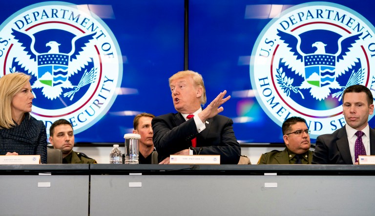 President Trump, accompanied by Homeland Security Secretary Kirstjen Nielsen, left, and U.S. Customs and Border Protection Acting Commissioner Kevin McAleenan, right, speaks during a roundtable at the Customs and Border Protection National Targeting Center in Reston, Va., Friday, Feb. 2, 2018.