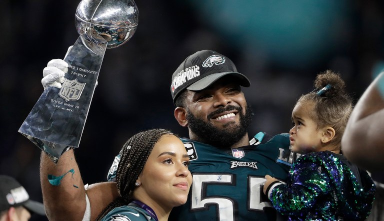 Philadelphia Eagles' Brandon Graham holds up the Vince Lombardi Trophy after the NFL Super Bowl 52 football game against the New England Patriots, Sunday, Feb. 4, 2018, in Minneapolis. The Eagles won 41-33.