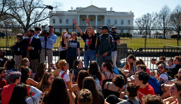 Demonstrators take part in a student protest for gun control legislation in front of the White House.