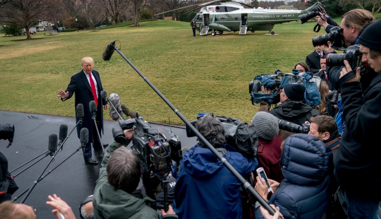 President Trump speaks to reporters before boarding Marine One on the South Lawn of the White House. 