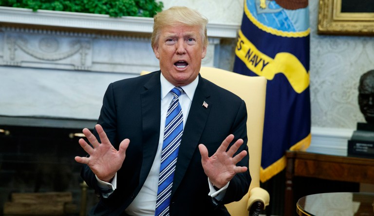 President Trump speaks in the Oval Office of the White House. 