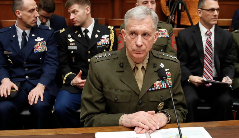 Marine Gen. Thomas Waldhauser takes his seat before testifying at a hearing.