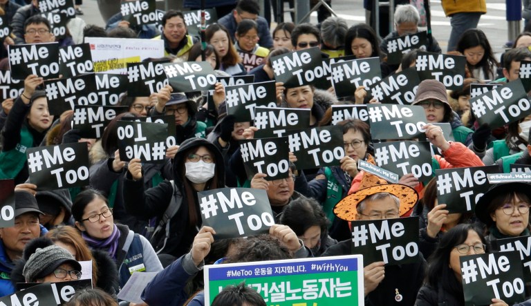 Demonstrators supporting the MeToo movement gather at a rally. 