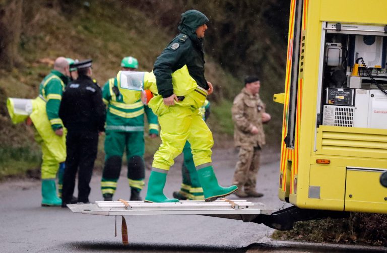 Military forces work on a van in Winterslow, England, as investigations continue into the nerve-agent poisoning of Russian ex-spy Sergei Skripal and his daughter Yulia, in Salisbury, England, on March 4, 2018.