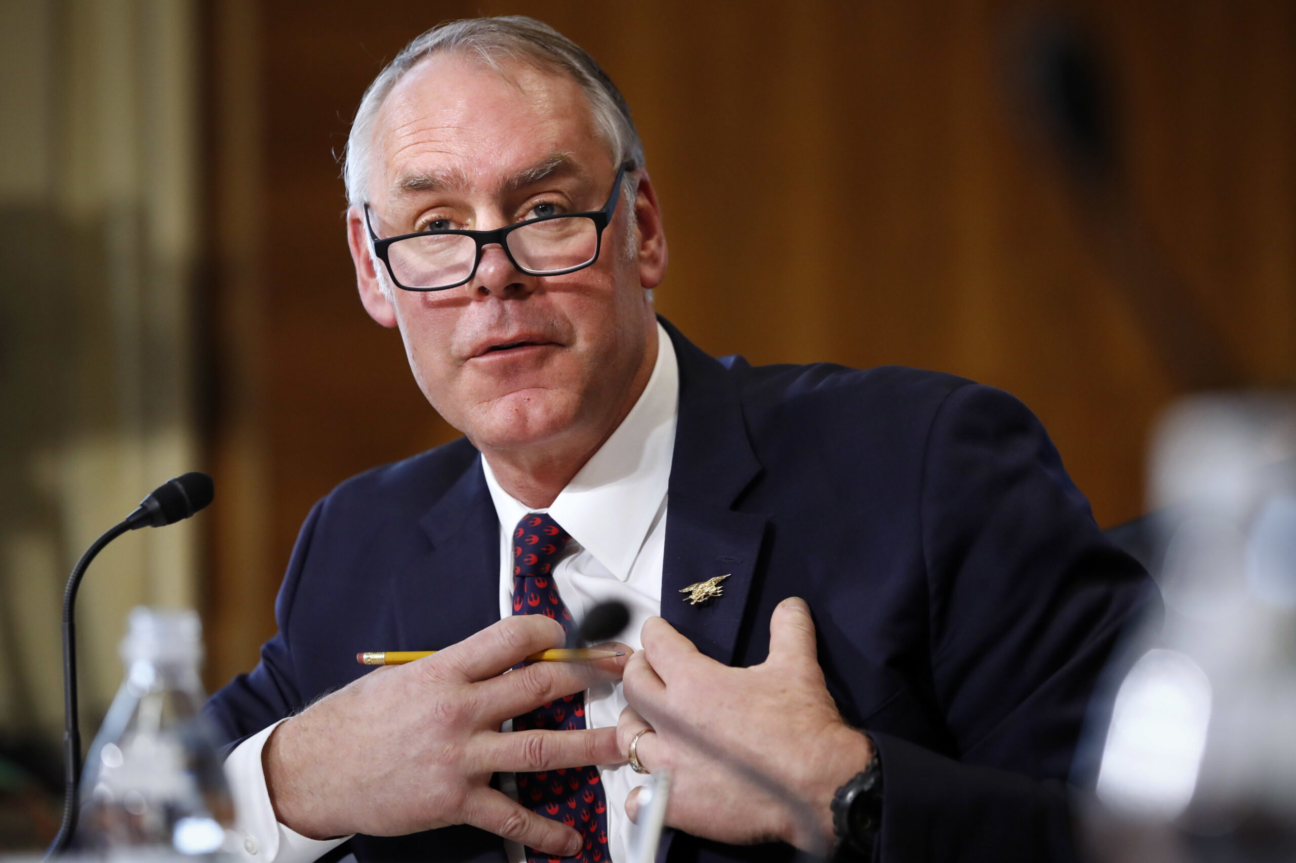 Ryan Zinke redacts political speech in socks photo to avoid violating ethics rules