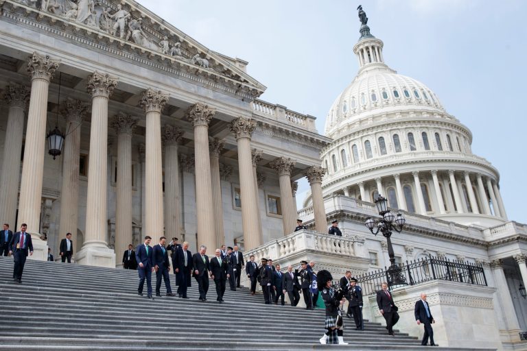 President Donald Trump walks down the steps of the Capitol building after a luncheon with Irish Prime Minister Leo Varadkar, Thursday, March 15, 2018, in Washington. From left, Speaker of the House Rep. Paul Ryan, R-Wis., Varadkar, Trump, Rep. Peter King, R-N.Y., and Vice President Mike Pence.