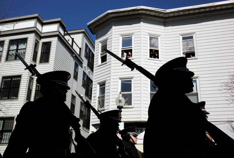 A U.S. Air Force Honor Guard marches during the annual St. Patrick's Day parade, Sunday, March 18, 2018, in Boston. The city's 117th St. Patrick's Day Parade followed a shortened snow route used three of the past four years due to the buildup of snow from three recent nor'easters.