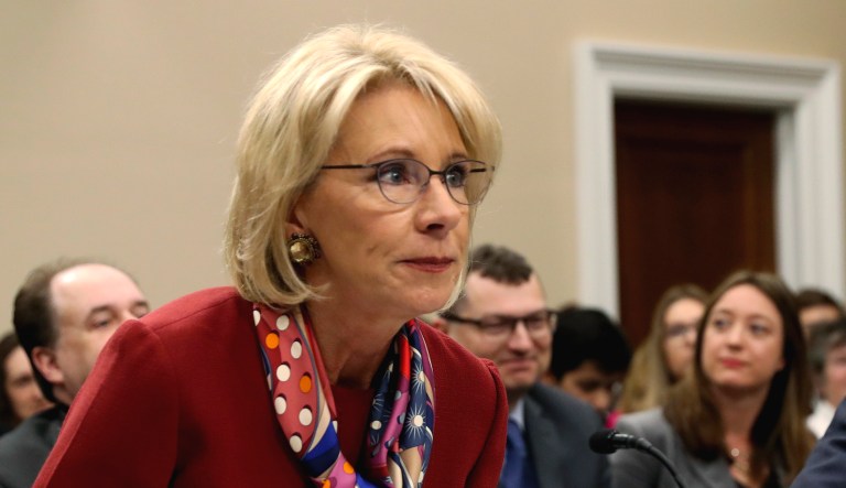 Education Secretary Betsy DeVos takes her seat before a House Committee on Appropriation subcommittee hearing on Capitol Hill in D.C.