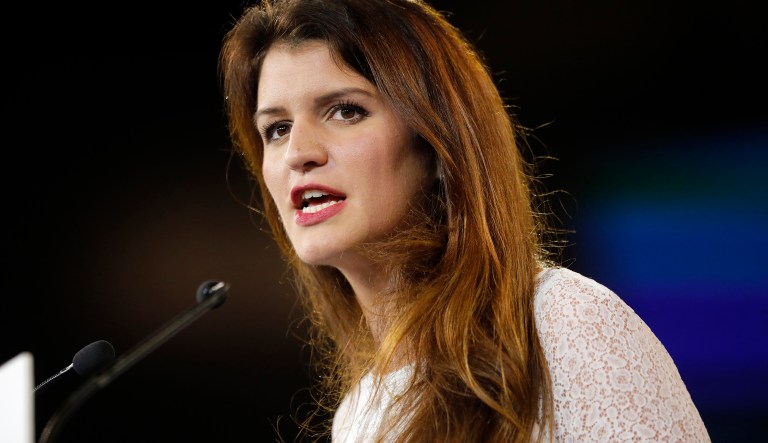 FILE - In this Nov.18, 2017 file photo, French deputy minister in charge of Equality between Women and Men Marlene Schiappa delivers a speech in Chassieu, near Lyon, central France. France's government presents Wednesday March 21 2018 a bill to fight against sexual and gender-based violence, in the wake of the #MeToo movement. Schiappa said last week in an interview to the AP the measure aims at imposing stiff fines for gender-based harassment on the street or in public transport.