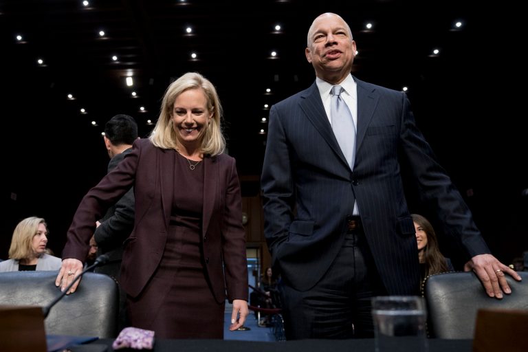 Homeland Security Secretary Kirstjen Nielsen, left, and former Homeland Security Secretary Jeh Johnson, right, arrive for a Senate Intelligence Committee hearing on election security on Capitol Hill in Washington, Wednesday, March 21, 2018.