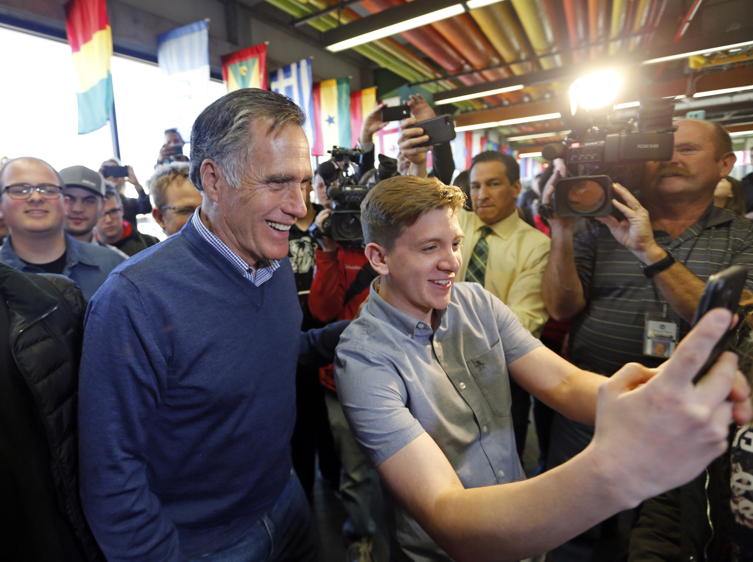 Mitt Romney minimizes hostilities with Trump as he campaigns for Senate