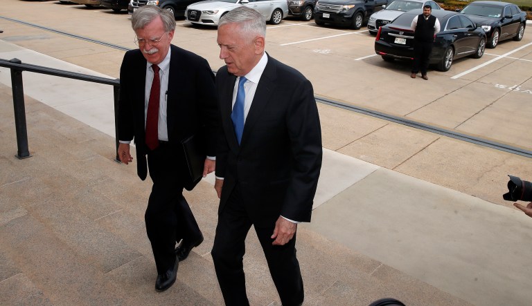 President Donald Trump's pick for national security adviser John Bolton, left, walks up the steps with Defense Secretary Jim Mattis, as Bolton arrives at the Pentagon, Thursday, March 29, 2018, in Washington. 